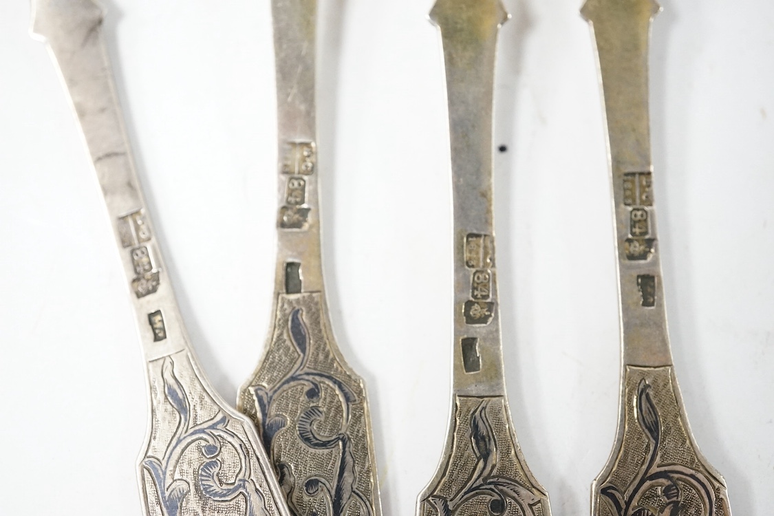 A set of four mid 19th century Russian 84 zolotnik and niello fiddle pattern dessert forks, assay master B.C. Moscow, 1853, 16.2cm, gross weight 4.1oz. Condition - poor to fair